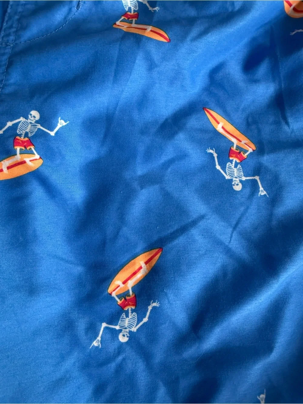 Wonder Nation Swim Trunks Boy’s Size 10/12 Large Blue Skeleton Surfer Print